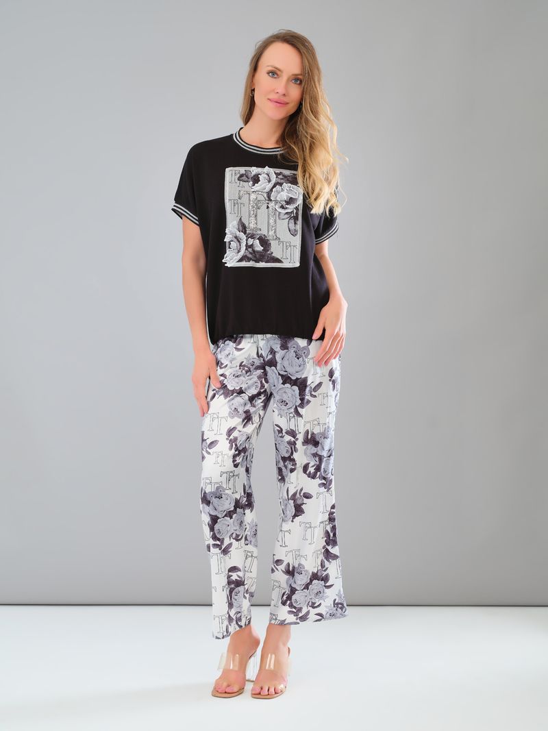 Pantalon à jambe large avec fleur Tricotto Pantalon à jambe large avec fleur Tricotto