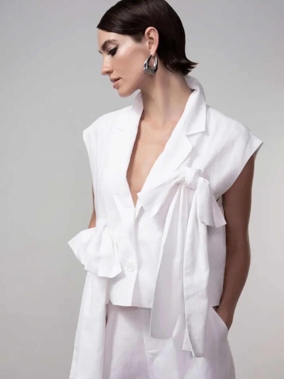 Veste avec grosse boucle HAAKO